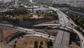 Aerial drone POV tracking of A5 highway and junctions in Cascais, Portugal