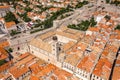 Aerial drone shot of bell tower coupola of Franciscan church on Stradun street in Dubrovnik old town in Croatia summer