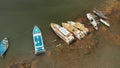 Aerial drone shot of a old, broken, rusty boats near the coast. 4k footage. Bali island, Indonesia.
