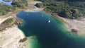 Aerial drone shot of the blue sea with boats near Hamaroy, Nordland, Norway