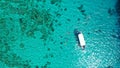 Aerial Drone Shot of Boat with Snorkelers out on the coral reef in Menjangan island, Bali, Indonesia Royalty Free Stock Photo