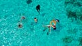 Aerial Drone Shot of Boat with Snorkelers out on the coral reef in Menjangan island, Bali, Indonesia Royalty Free Stock Photo