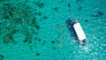 Aerial Drone Shot of Boat with Snorkelers out on the coral reef in Menjangan island, Bali, Indonesia Royalty Free Stock Photo