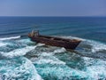 Aerial drone shot of cargo shipwreck in Paphos with waves Cyprus island storm Mediterranean sea Royalty Free Stock Photo