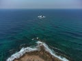 Aerial drone shot of cargo shipwreck in Paphos with waves Cyprus island storm Mediterranean sea Royalty Free Stock Photo