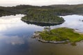 Aerial drone shot of Castle Tioram, it is a ruined castle that sits on the tidal island Eilean Tioram in Loch Moidart, Lochaber, Royalty Free Stock Photo