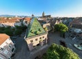 Aerial Drone Shot of the city of Colmar in Alsace France. Green shingles of Koifhus. Quiet streets at sunny Morning. Royalty Free Stock Photo