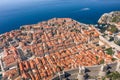 Aerial drone shot of Dubrovink city old town with view of fort in Croatia summer morning