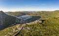 Aerial drone shot of Fortress of City of Ston on top of hill with view of Salt Pans in Croatia sunrise