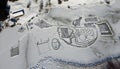 Aerial drone shot of frozen lake in winter with ice skaters Royalty Free Stock Photo