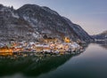 Aerial drone shot of Hallstatt village covered by snow during du Royalty Free Stock Photo
