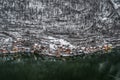 Aerial drone shot of Hallstatt village snow covered by snow hous Royalty Free Stock Photo