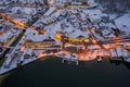 Aerial drone shot of Lahn village center by Hallstatt lake in winter after sunset in Austria Royalty Free Stock Photo