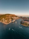 Aerial drone shot of Lapad Gruz peninsula area with Dubrovnik bridge cruise ship in Croatia summer sunset Royalty Free Stock Photo