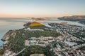 Aerial drone shot of Lapad hill in Dubrovnik town with sunrise over the peak in Croatia summer morning