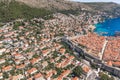 Aerial drone shot of Minceta Fort on Dubrovnik old town wall with view of stradun street in Croatia summer noon Royalty Free Stock Photo