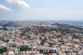 Aerial drone shot of northern side of Acropoli and Filopappou Hill in Athens