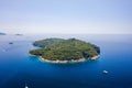 Aerial drone shot of Otok Lokrum in Adriatic sea by Dubrovnik old town port in Croatia summer Royalty Free Stock Photo