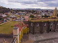 Aerial Drone Shot of San Gabriel Archangel Cathedral at cloudy day in Cholula, Puebla, Mexico Royalty Free Stock Photo