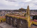 Aerial Drone Shot of San Gabriel Archangel Cathedral at cloudy day in Cholula, Puebla, Mexico Royalty Free Stock Photo