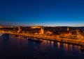 Aerial drone shot of St. Anne Parish church by Danube river at Budapest dusk city lights on Royalty Free Stock Photo