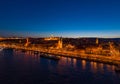 Aerial drone shot of St. Anne Parish church by Danube river at Budapest dusk city lights on Royalty Free Stock Photo