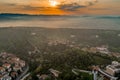 Aerial drone shot view of sunrise on foggy Veronetta colline with Castel San Pietro and funicolare Royalty Free Stock Photo