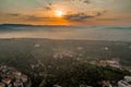 Aerial drone shot view of sunrise on foggy Veronetta colline with Castel San Pietro and funicolare Royalty Free Stock Photo