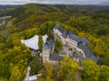 Aerial Drone Shot in Wiltz Luxembourg. View on a Castle at cloudy autumn day in Wiltz