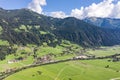 Aerial drone shot of Zillertal valley with clouds in Tyrol Austria summer