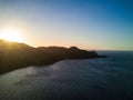 Aerial Drone Sunset Photo - Lush jungles and mountains of the Pacific Ocean coast of Costa Rica Royalty Free Stock Photo