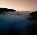 Aerial Drone Sunset Photograph - Fog & Clouds in the Colorado Rocky Mountains Royalty Free Stock Photo