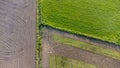 Aerial drone top down view, Rows of soil before planting. Agricultural farm pattern in a plowed field prepared Royalty Free Stock Photo