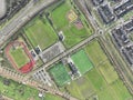 Aerial drone top down view on sports field, amateur sports grounds. Birds eye top down overview. Recreation leisure and Royalty Free Stock Photo
