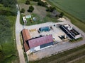 Aerial drone top view of a building site working on a barn conversion in the countryside. Building, conversion, new life,