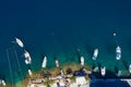 Aerial drone top view photo of colourful wooden traditional fishing boat in turquoise sea shore of Simy island, Greece