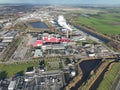 Aerial drone video provides a bird's eye view of a waste burning plant, showcasing the process and technology used