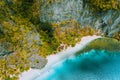 Aerial drone view of abandoned house hut on Pinagbuyutan Island in El Nido. Amazing white sand beach and emerald lagoon Royalty Free Stock Photo