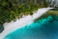 Aerial drone view of abandoned house hut on Pinagbuyutan Island in El Nido. Amazing white sand beach and emerald lagoon Royalty Free Stock Photo