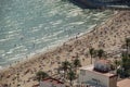 Aerial and drone view from above to people on Alicante Beach, Costa Blanca