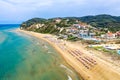 Aerial drone view of Agios Stefanos beach, a small tourist resort on the north east coast of Corfu in Greece Royalty Free Stock Photo