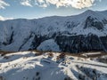 Aerial drone view of Gudauri ski resort in winter. Caucasus mountains in Georgia. Amaglebis eklesia church top hill in Gudauri, Royalty Free Stock Photo