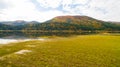 Aerial drone view of amazing autumn colors on the lake. Cerknisko lake, Slovenia