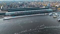 Aerial drone view Amsterdam Central Train Station with Amsterdam sign on roof. Bird's eye view autumn cityscape Royalty Free Stock Photo