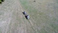 Aerial drone view of ATV quads on a dirt trail in forests. Off-road group team club enthusiasts having fun while driving