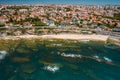 Aerial drone view of Avencas beach with Parade district in Greater Lisbon, Portugal