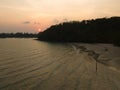 Aerial drone view of beautiful beach with sunset and palm trees of Gulf of Thailand. Kood island, Thailand. Royalty Free Stock Photo