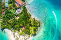 Aerial drone view of beautiful caribbean tropical island Cayo Levantado beach with palms and boat. Bacardi Island, Samana, Royalty Free Stock Photo