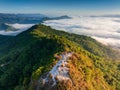 Aerial drone view beautiful morning Sunrise Fog flow over mountain in Ai yerweng, Yala, Thailand Royalty Free Stock Photo