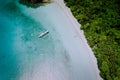 Aerial drone view of the beautiful paradise lagoon and white sand beach. Local boats on the surface. Summer exotic Royalty Free Stock Photo